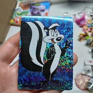 PRISM Holographic Skunk Trading Card - Black and Blue